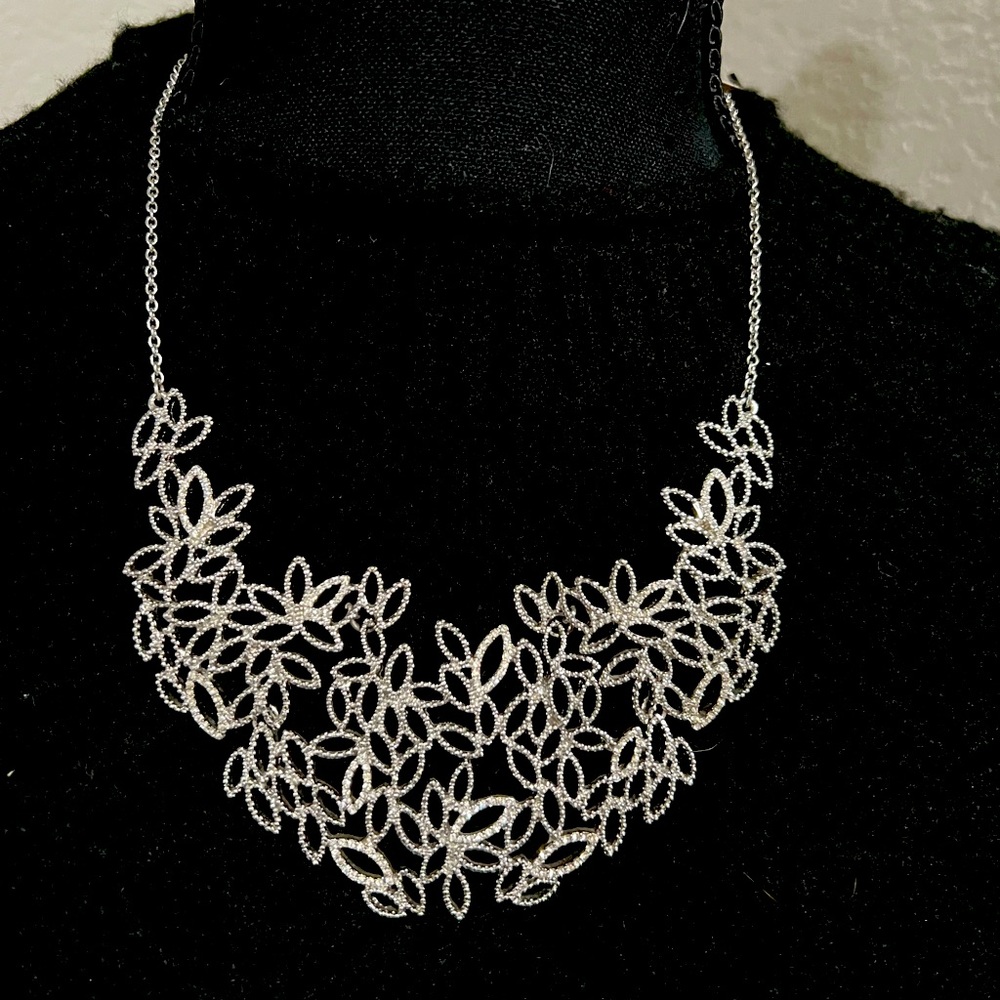 Intricate silver collar necklace